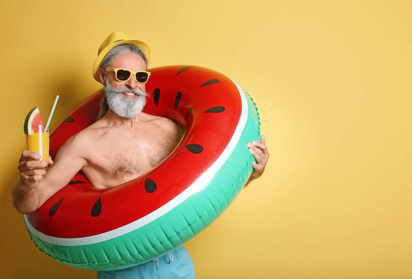 funny-older-traveler-with-his-inner-tube-during-vacation-after-canceling-his-timeshare-mortgage-paid-off-with-voc