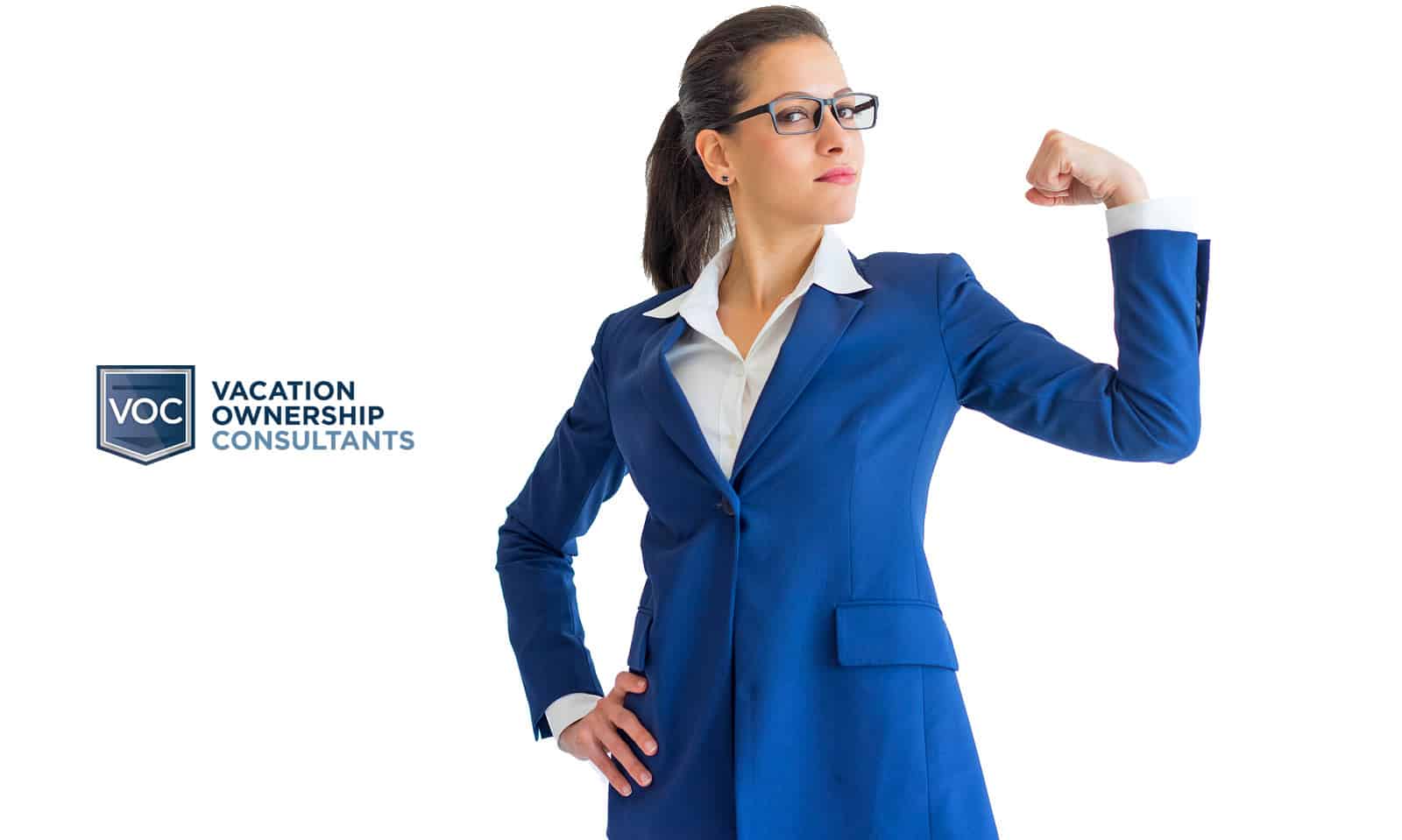 woman-flexing-muscle-in-blue-suit-representing-voc-right-to-use-timeshare-cancellation-options-in-comparison-to-travel-clubs-across-united-states