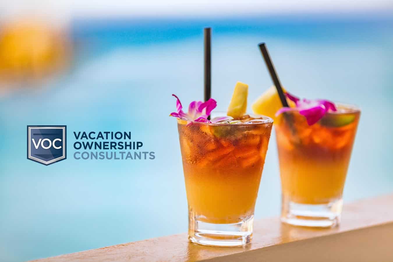 vacation-ownership-consultants-drinks-on-beach-signifying-travel-presentation-meeting-for-consumers-looking-to-buy-timeshares