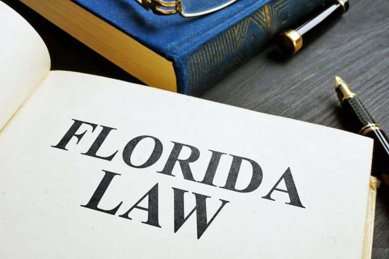 open-documenting-book-with-florida-law-written-on-it-signifying-bill-passed-in-favor-of-timeshare-developers-for-special-assessments