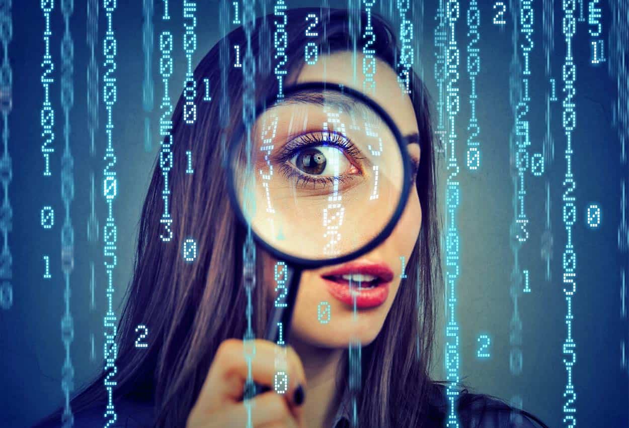 girl-with-beautiful-eye-looking-through-magnifying-glass-towards-data-and-computer-numbers-online-saving-personal-consumer-data-from-timeshare-transactions