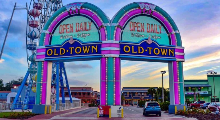 image-of-entrance-to-old-town-kissimmee-florida-during-dusk-with-blue-car-to-explain-where-cypress-palms-timeshare-resort-is-located-for-tax-assessment-lawsuit