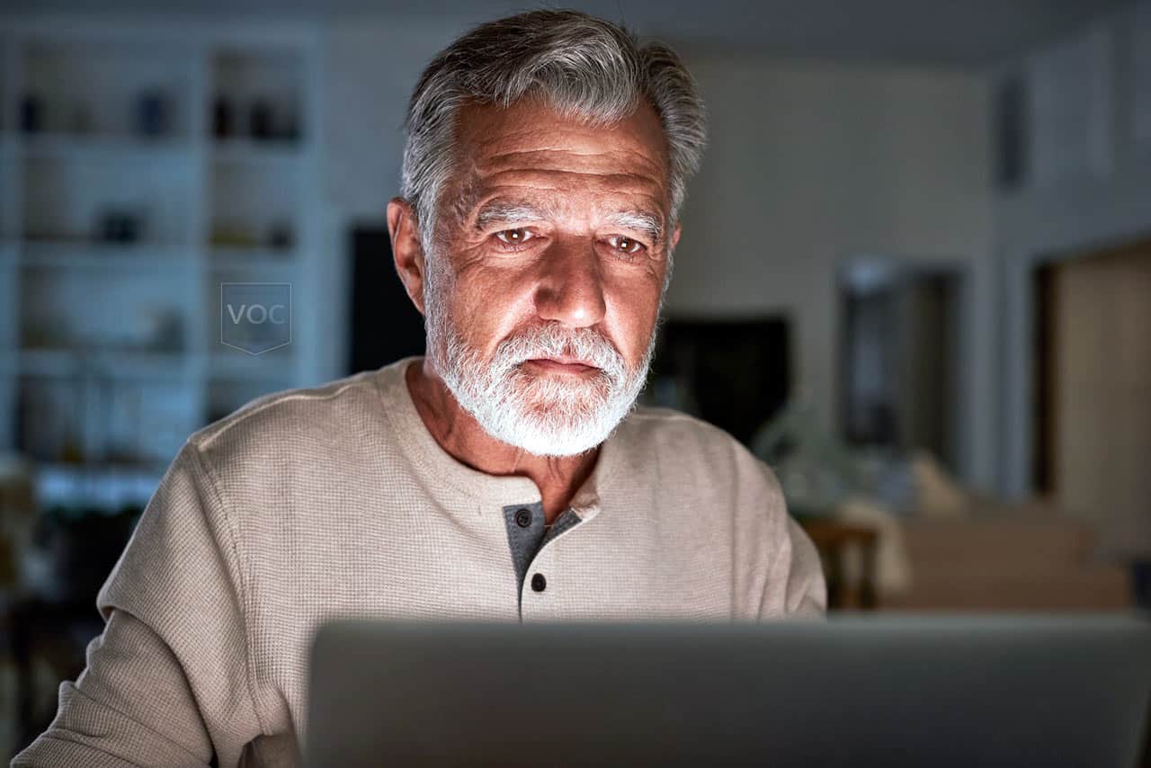 man-looking-at-computer-wondering-can-i-rent-my-timeshare-contract-to-pay-mortgage-off-and-escape