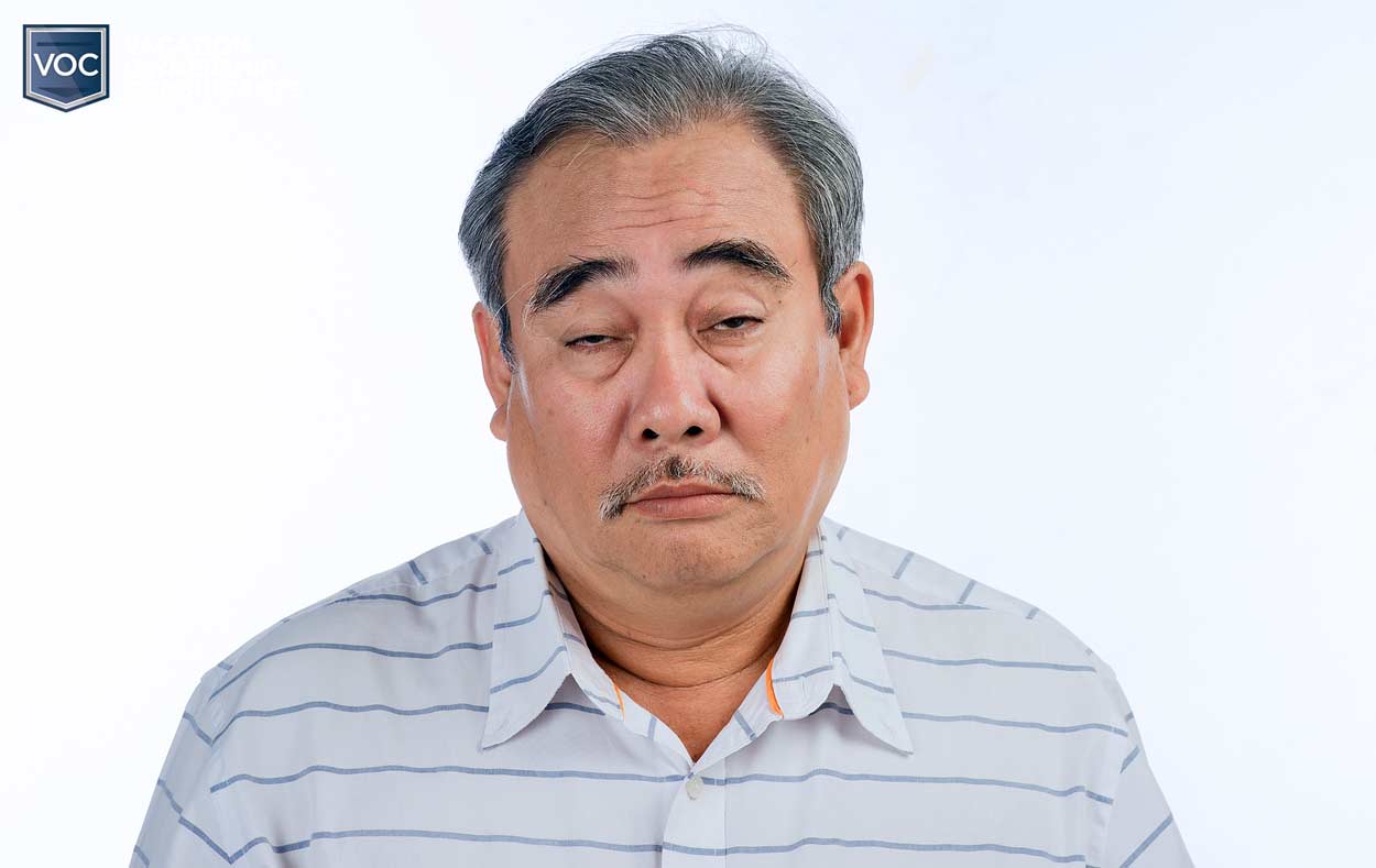 depressed-looking-asian-guy-after-making-poor-timeshare-puirchase-but-not-his-fault-he-was-lied-to-by-resort-company