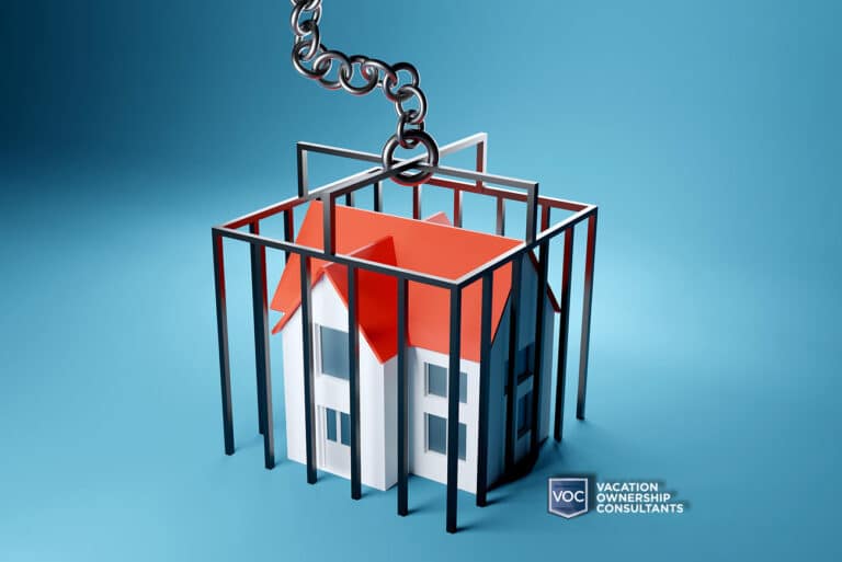 property-building-with-red-roof-blue-background-where-caged-has-dropped-down-trapping-it-voc-timeshare-fraud