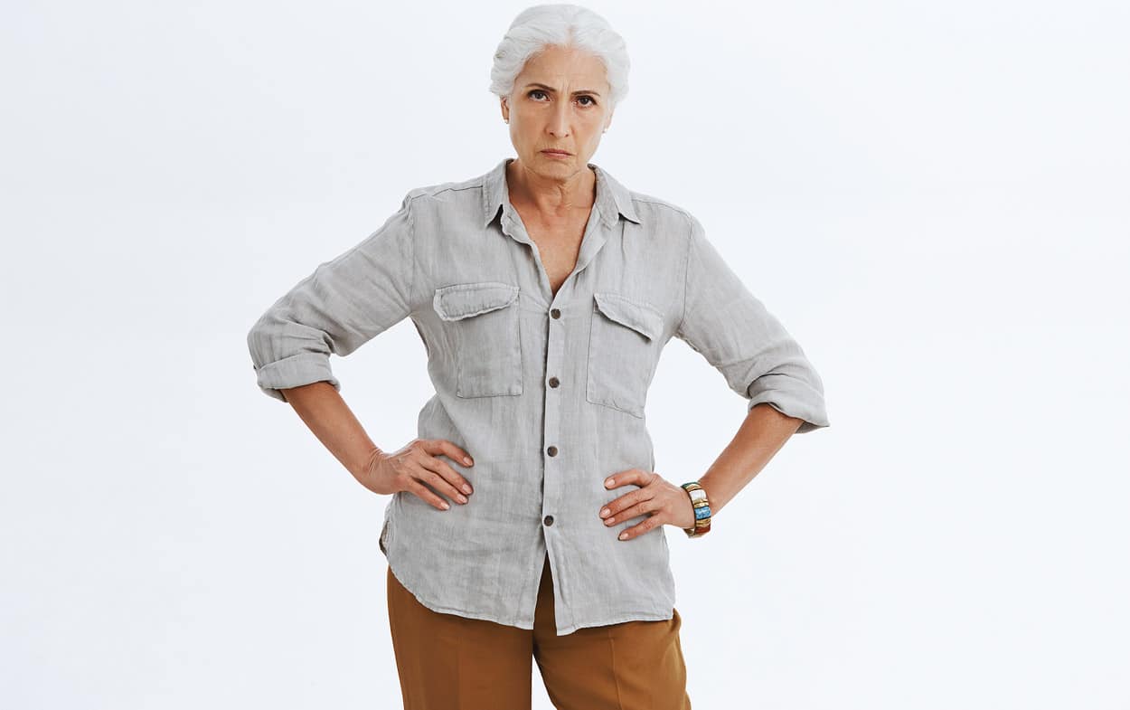 hands-on-hids-khaki-pants-older-woman-scowling-over-sale-of-timeshare-lies