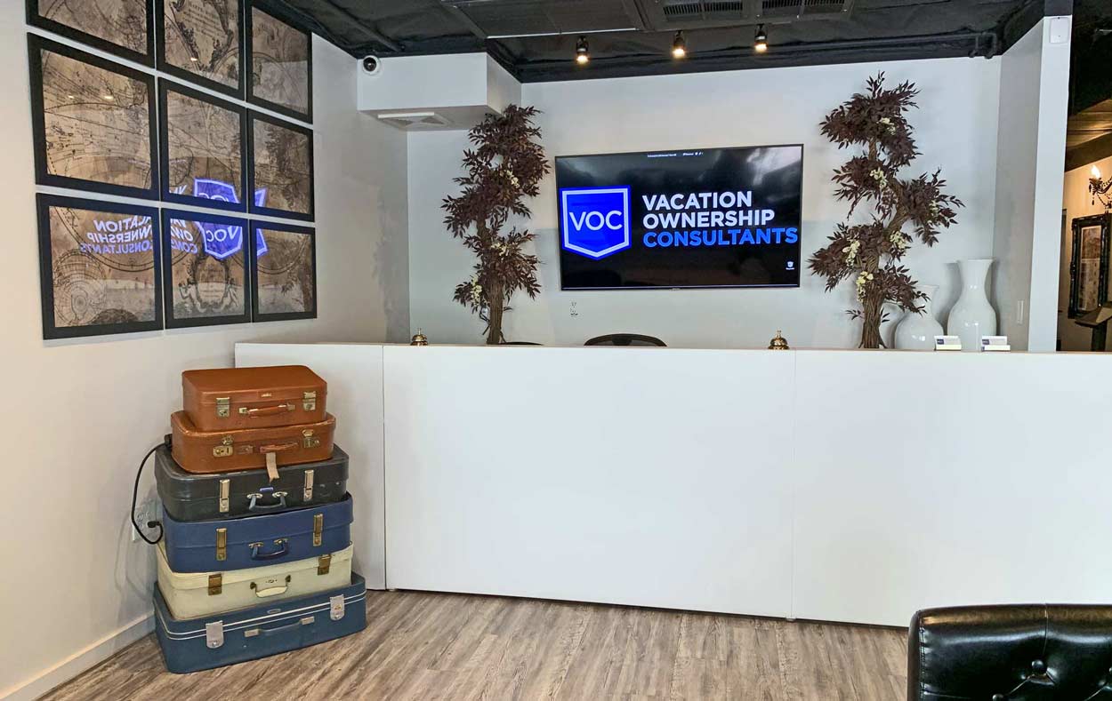 entrance to vacation ownership consultants in scottsdale az with welcome center travel decor and stacked luggage for comfortable environment to cancel timeshares